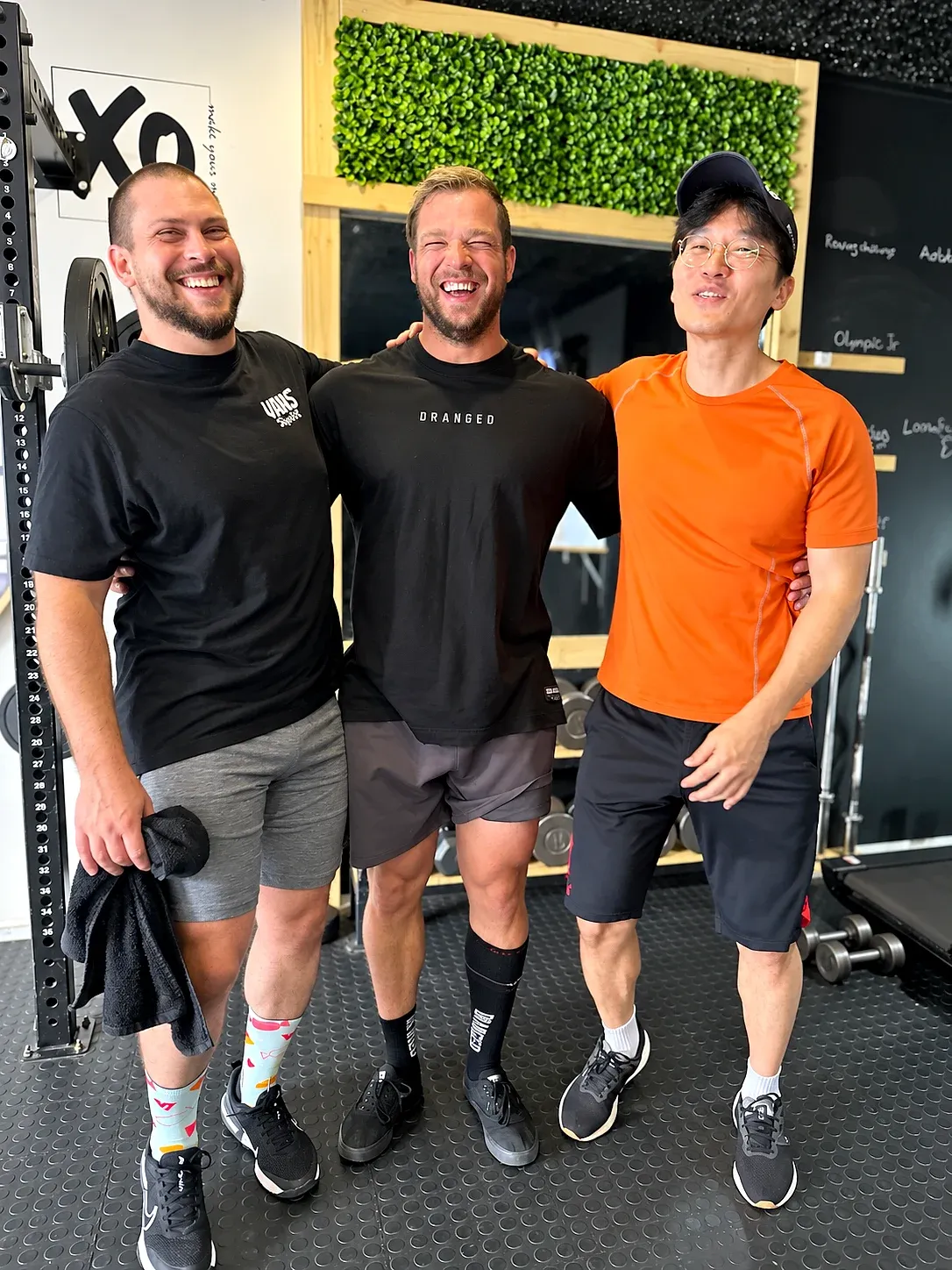 The XO Fit gym: three people in the gym